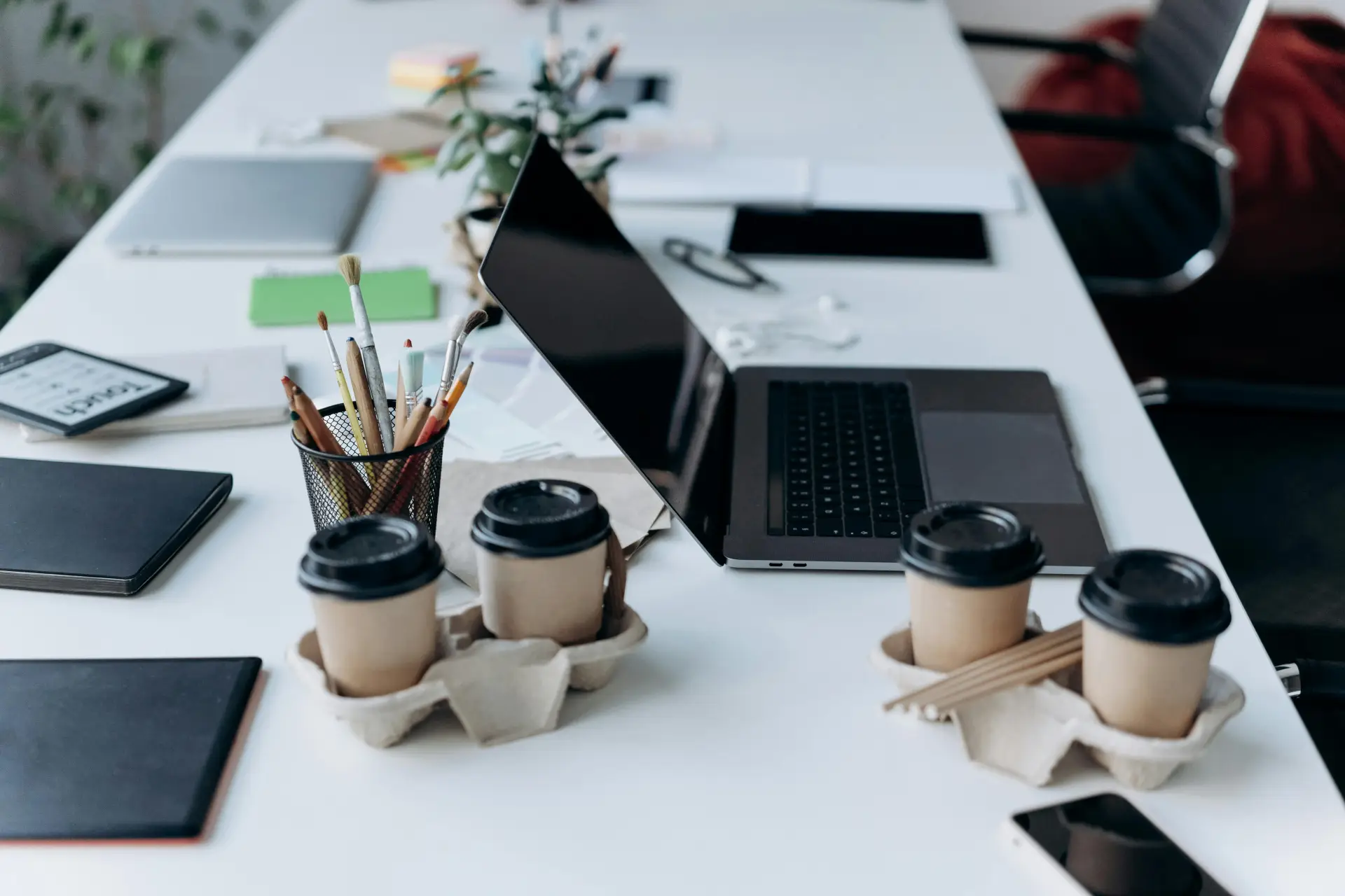 laptop and coffees on desk