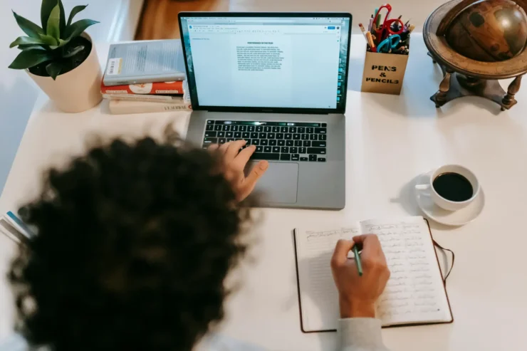 person working at hot desk