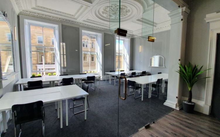 Bright, naturally lit office space with private yet open areas designed for flexible work arrangements.