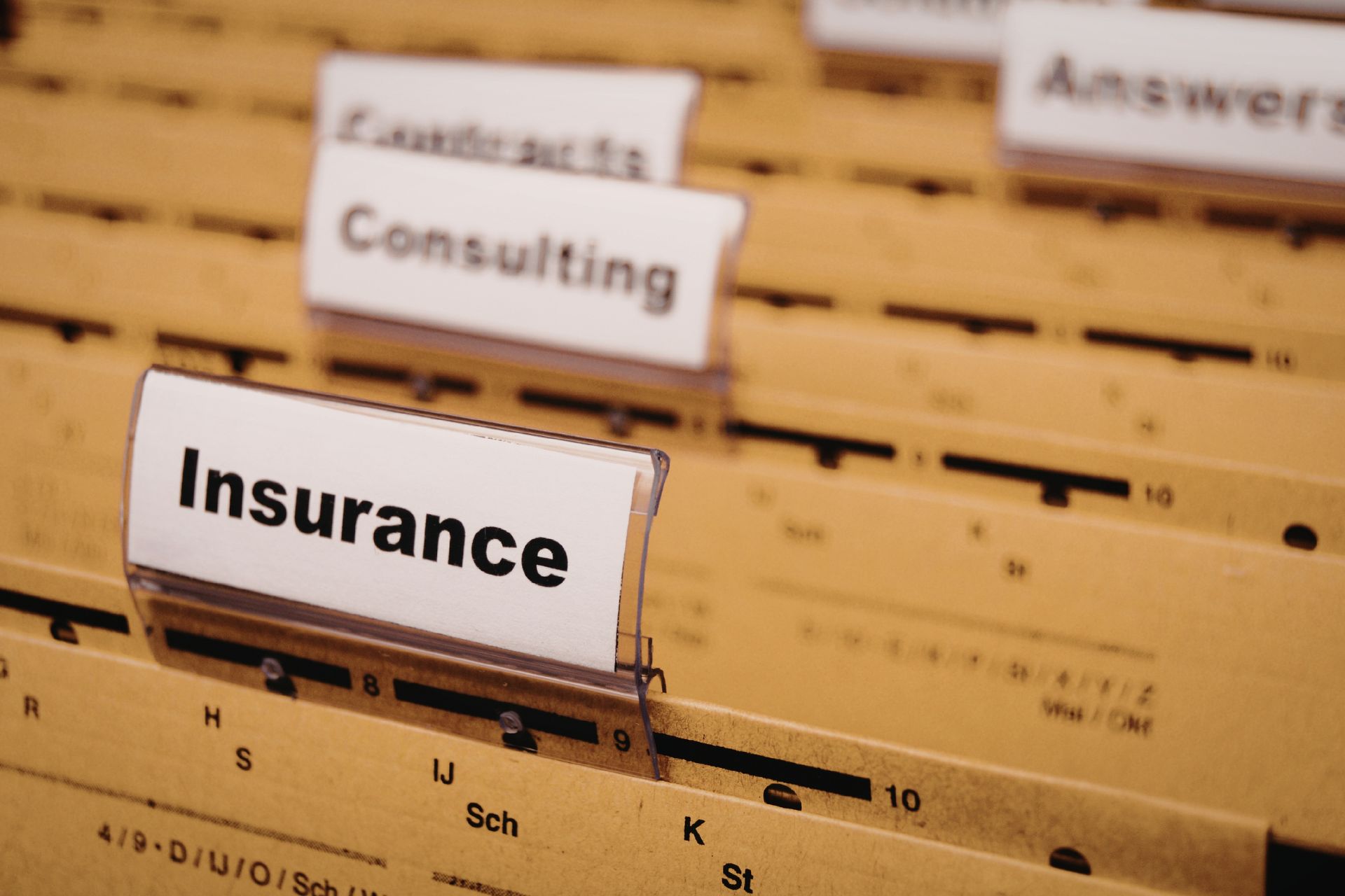 Organized office filing system with insurance label