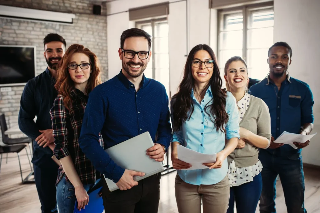 Happy employees in modern office