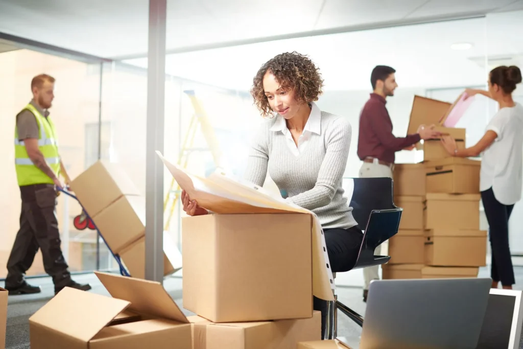 Employees setting up on new office move day