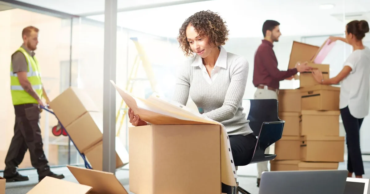 Employees setting up on new office move day
