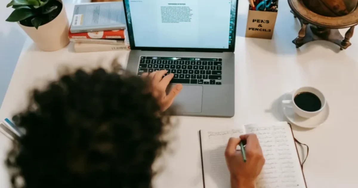 person working at hot desk