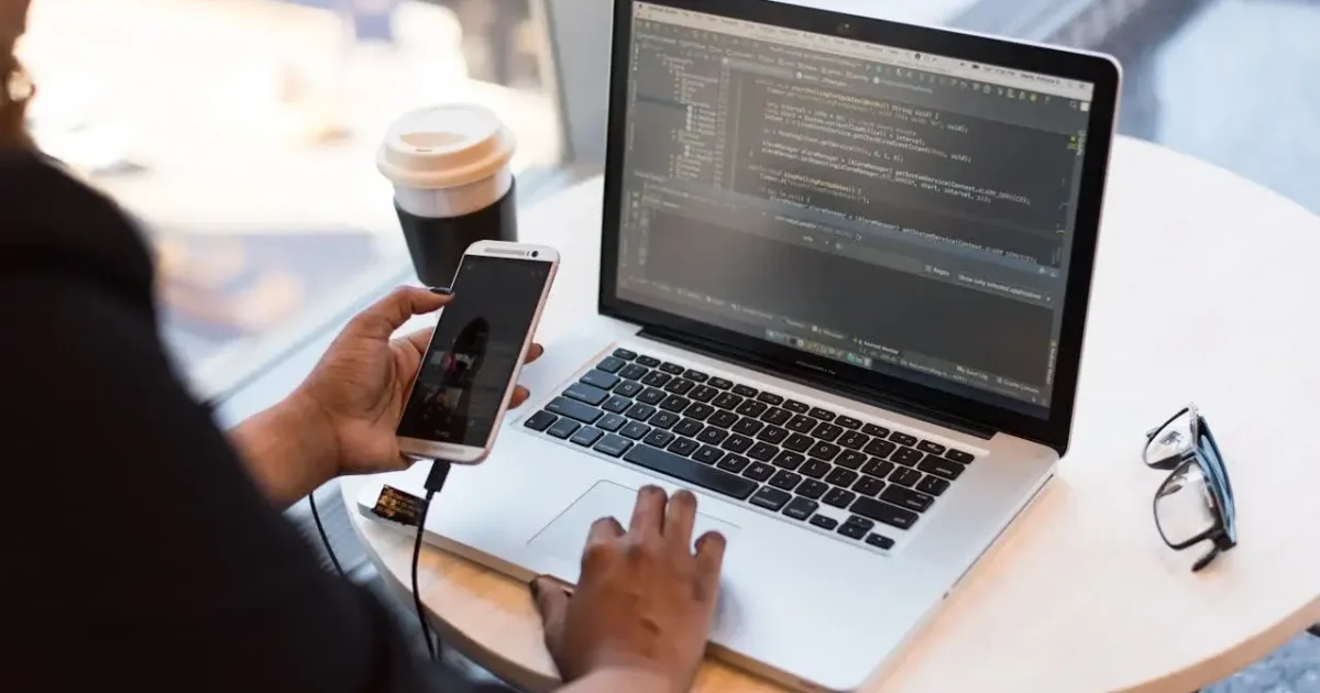 person working on laptop code